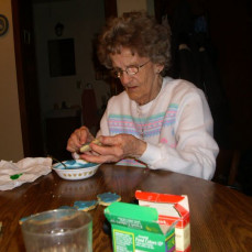 Grandma Milly being her beautiful playfull self.
It was Christmas cookie decorating time! - Bradley Funeral Home