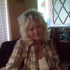 Happy Mother's Day. I remember when I took this photo of you and you thought you looked so good in Grandpa Buchanan's flannel. We all love and miss you, think and talk about you everyday. 

Love Cheri, Jeff and kids - Cheri