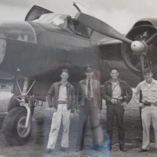 Bud (far left) with crew and plane used to perform aeromagnetic surveys. Bud was the electrical engineer in charge of running the survey equipment on the plane.  - David Osborn