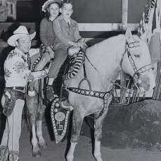 Alfred first discovering his love of horses...on trigger with Roy Rogers! - Merle MacFarlane