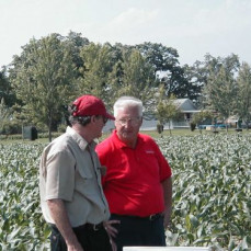 Denis and Ray Knake in a seed corn field, 2001 - Gary Munkvold