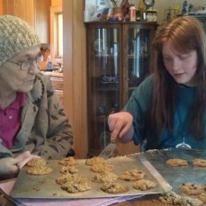 Mom & Magan making oatmeal cookies. - Mary