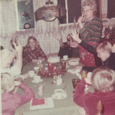 Christmas ca. 1960s at Aunt Peggy's with Eddie lower right raising hand for dessert! - Linda Mead