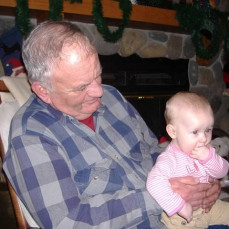 12/08 - Grandpa Grekso holding Zoey Marcia.  1st Christmas - Jessica Grekso