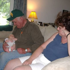 06/08 - Grandpa Grekso holding Zoey Marcia (1 month old) for the first time. - Jessica Grekso