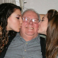 Tom receiving loving kisses from his granddaughters Abby & Casey - Casey (Hutchinson) Bainter