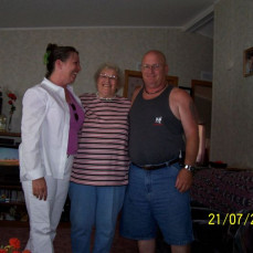 Here is a picture of Betty with Ken & Kenna in July 2005 at Betty's house in enjoying the day. - Cascade Memorial