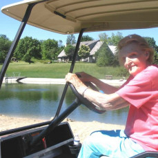 Louise driving the golf cart.
 - Linda Derrick