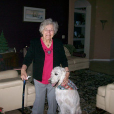 Mom loved all animals.  Here, she is enjoying time with Harley, Tom's labradoodle. - JoAnn Hermann